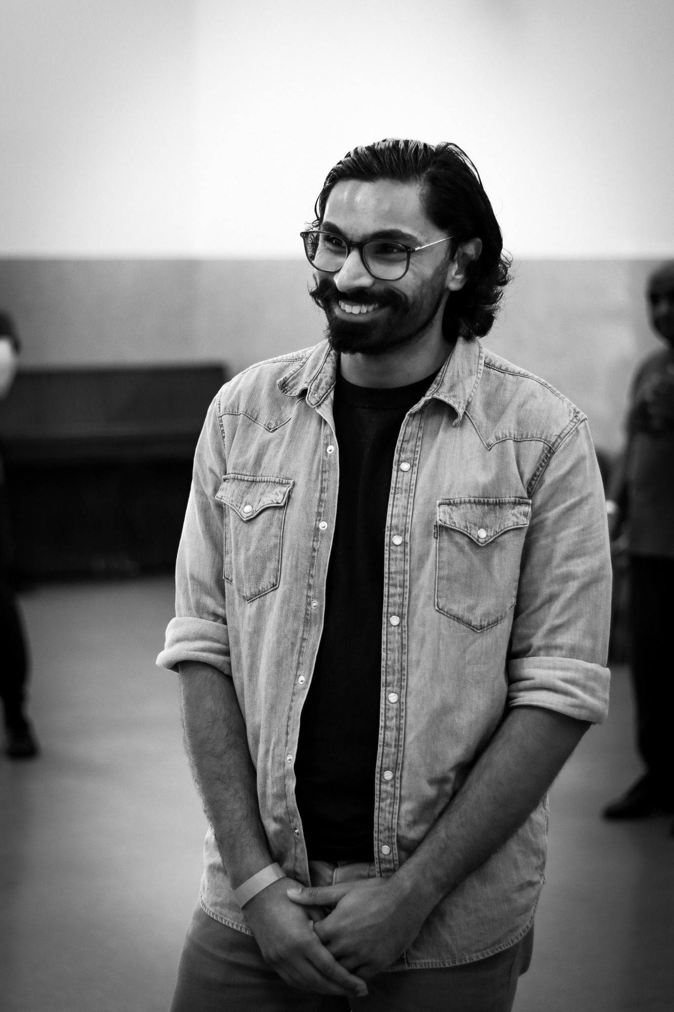 Black and white image of a man smiling