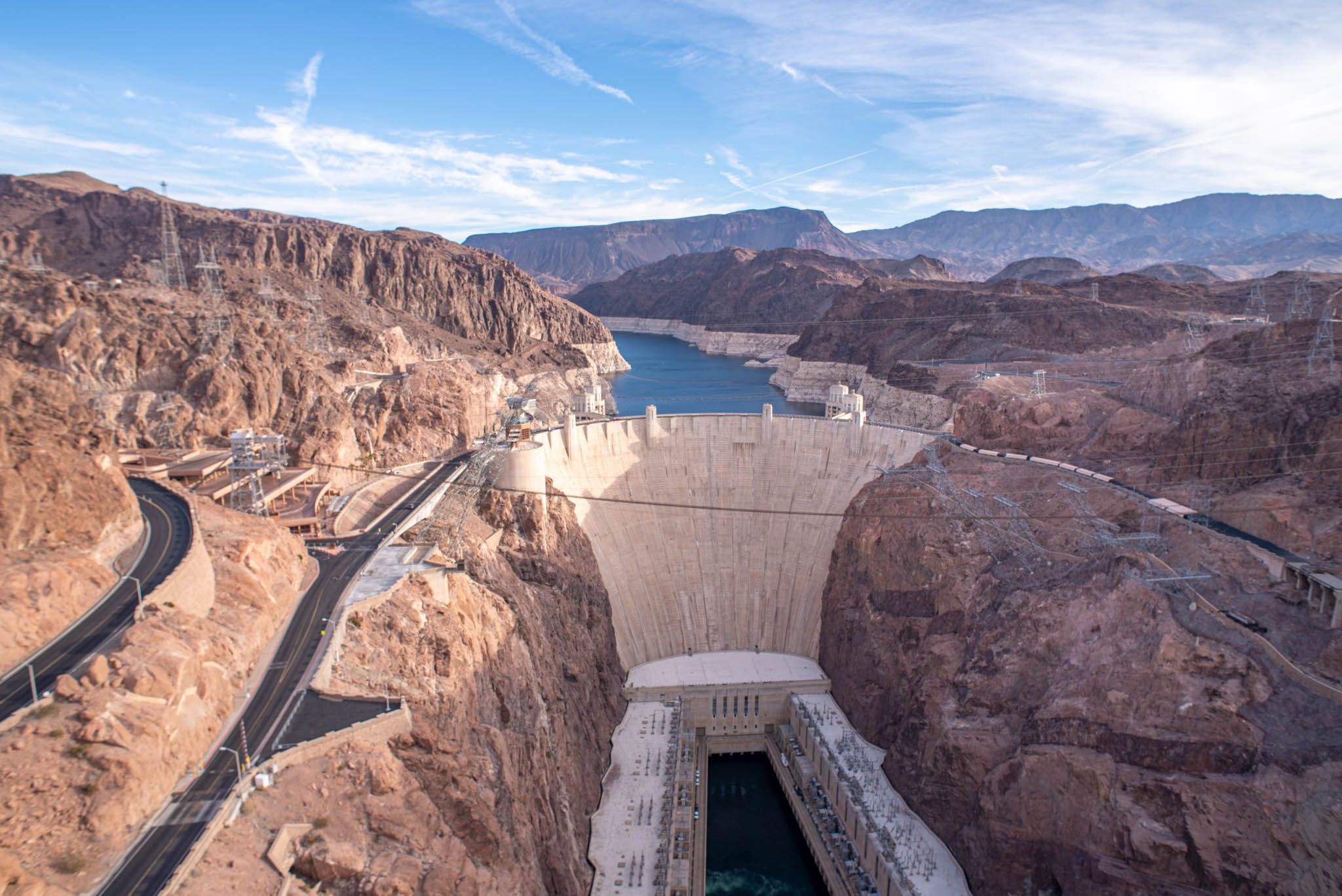 Water dam surrounded by red rocks